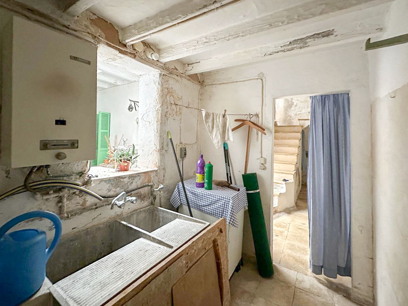 Casa mallorquina con carácter y gran potencial para renovar en el pueblo de muro.