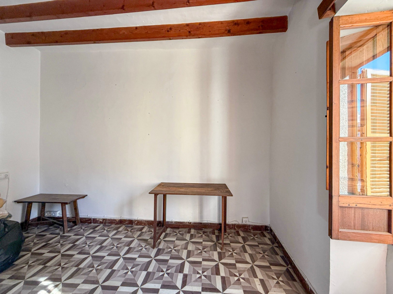 Spacious Duplex House in Llubí with Patio, Garage, and Potential for Upgrades