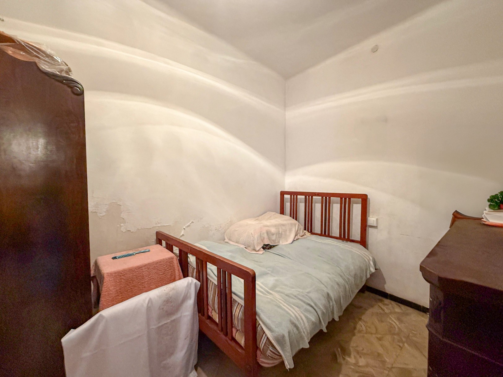 Spacious Duplex House in Llubí with Patio, Garage, and Potential for Upgrades
