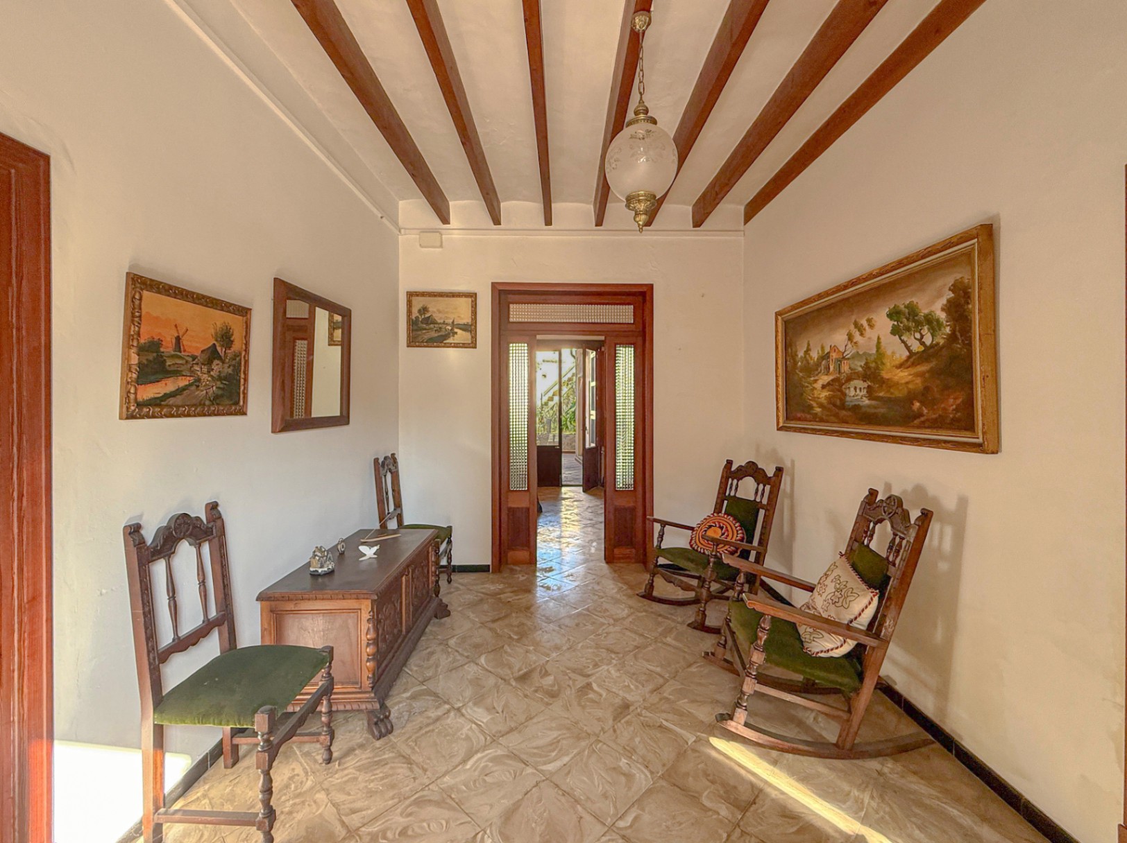 Spacious Duplex House in Llubí with Patio, Garage, and Potential for Upgrades