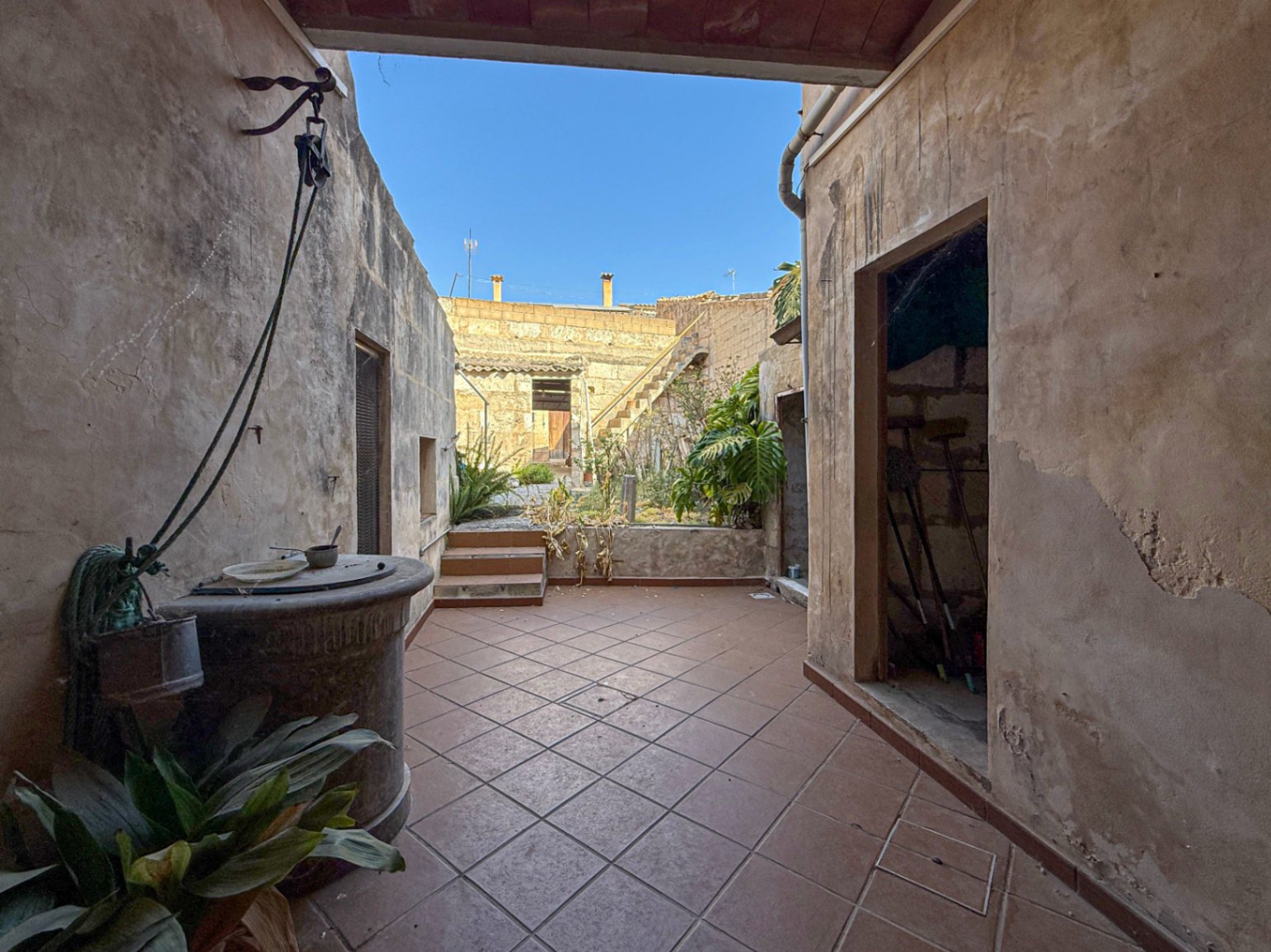 Spacious Duplex House in Llubí with Patio, Garage, and Potential for Upgrades