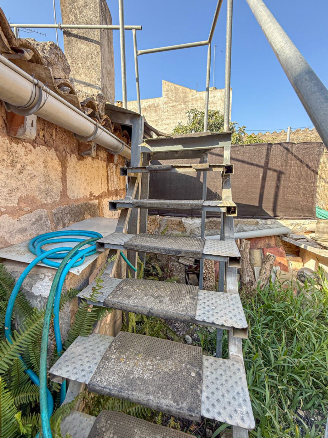 Spacious Duplex House in Llubí with Patio, Garage, and Potential for Upgrades