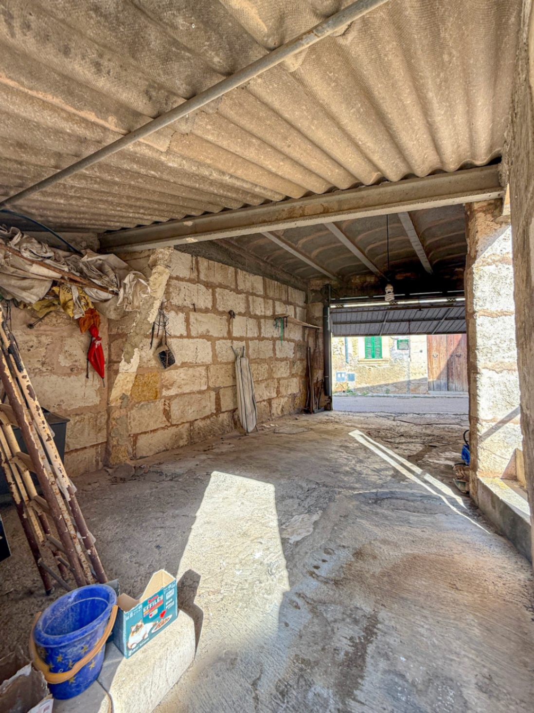 Spacious Duplex House in Llubí with Patio, Garage, and Potential for Upgrades