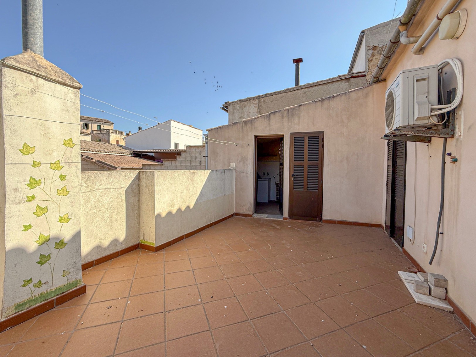Spacious Duplex House in Llubí with Patio, Garage, and Potential for Upgrades