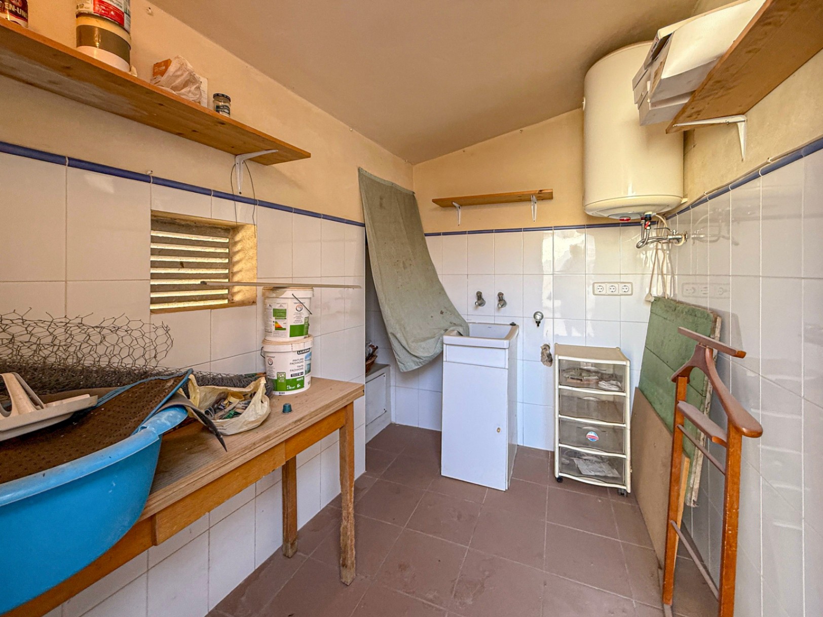 Spacious Duplex House in Llubí with Patio, Garage, and Potential for Upgrades