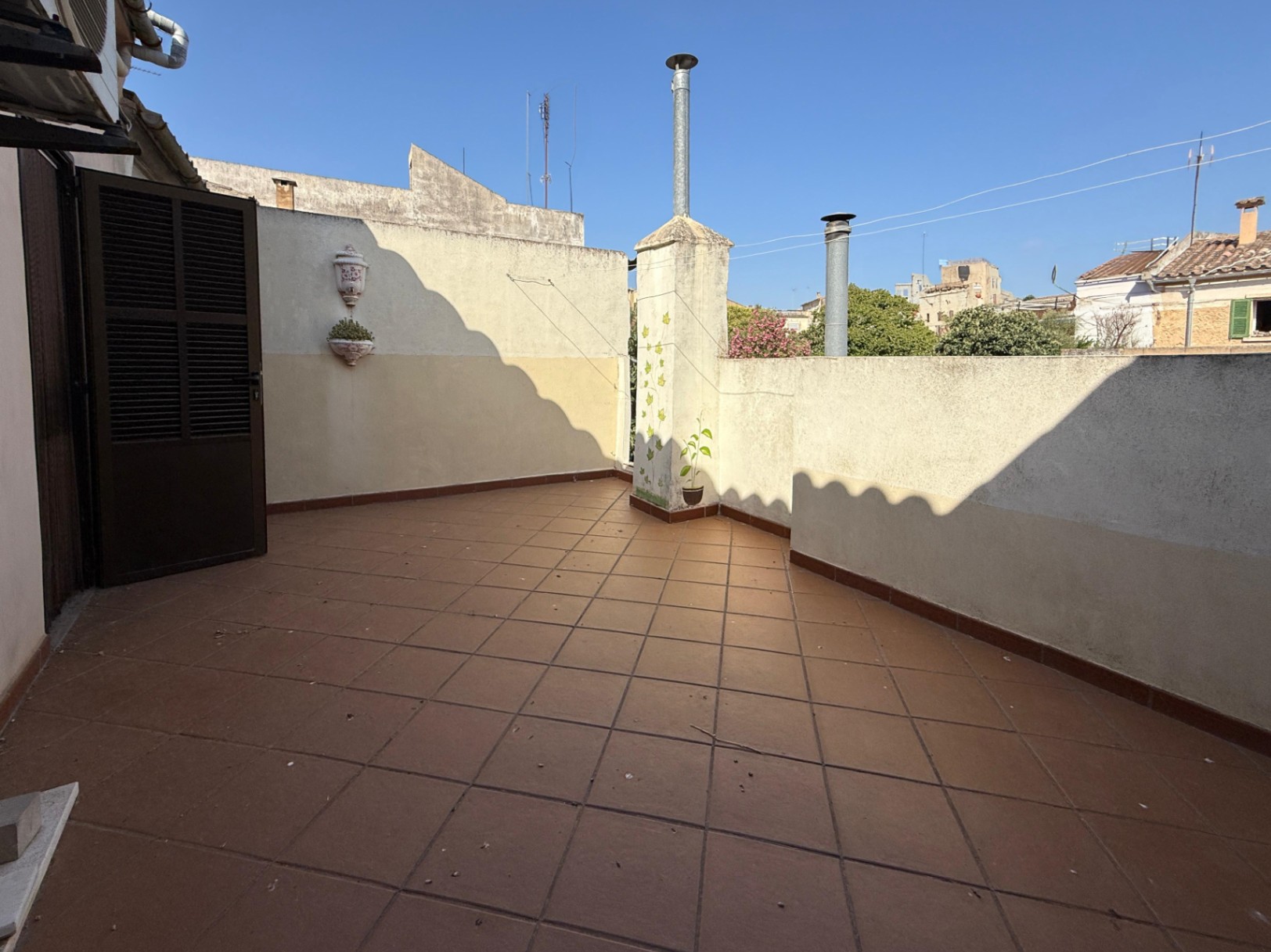 Spacious Duplex House in Llubí with Patio, Garage, and Potential for Upgrades