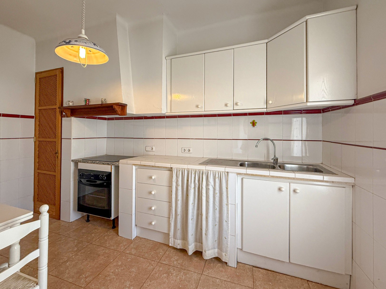Spacious Duplex House in Llubí with Patio, Garage, and Potential for Upgrades