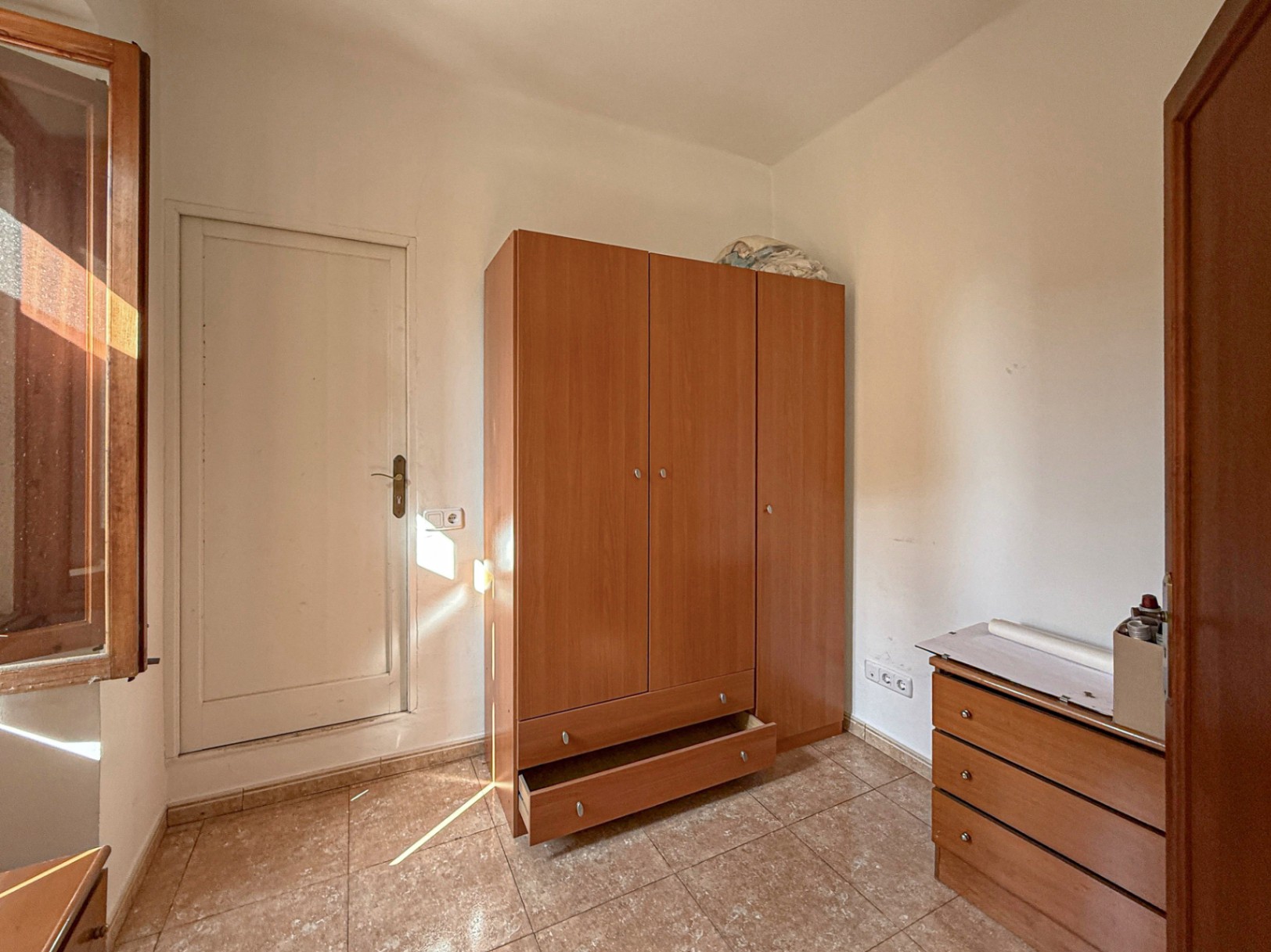 Spacious Duplex House in Llubí with Patio, Garage, and Potential for Upgrades