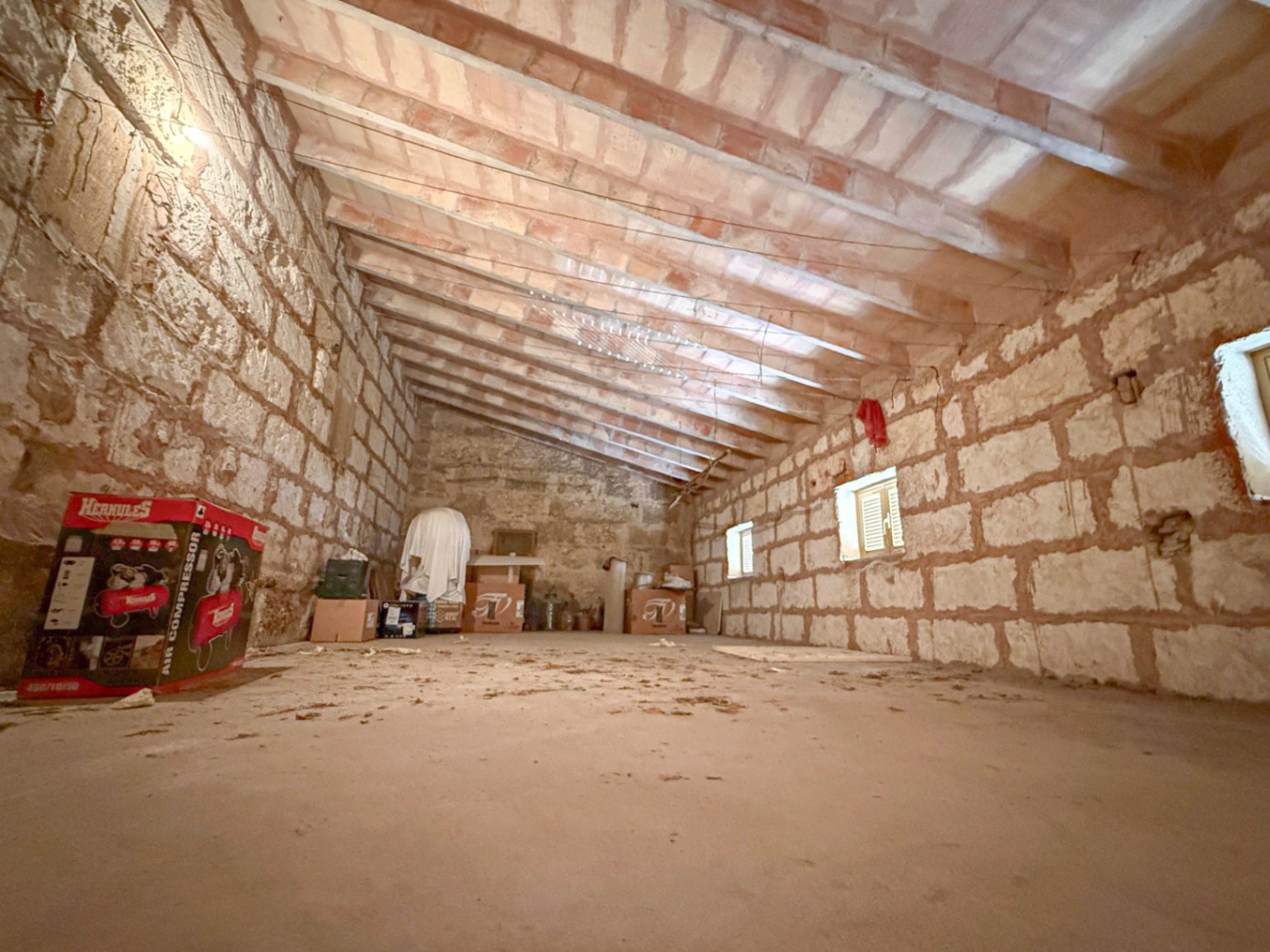 Spacious Duplex House in Llubí with Patio, Garage, and Potential for Upgrades