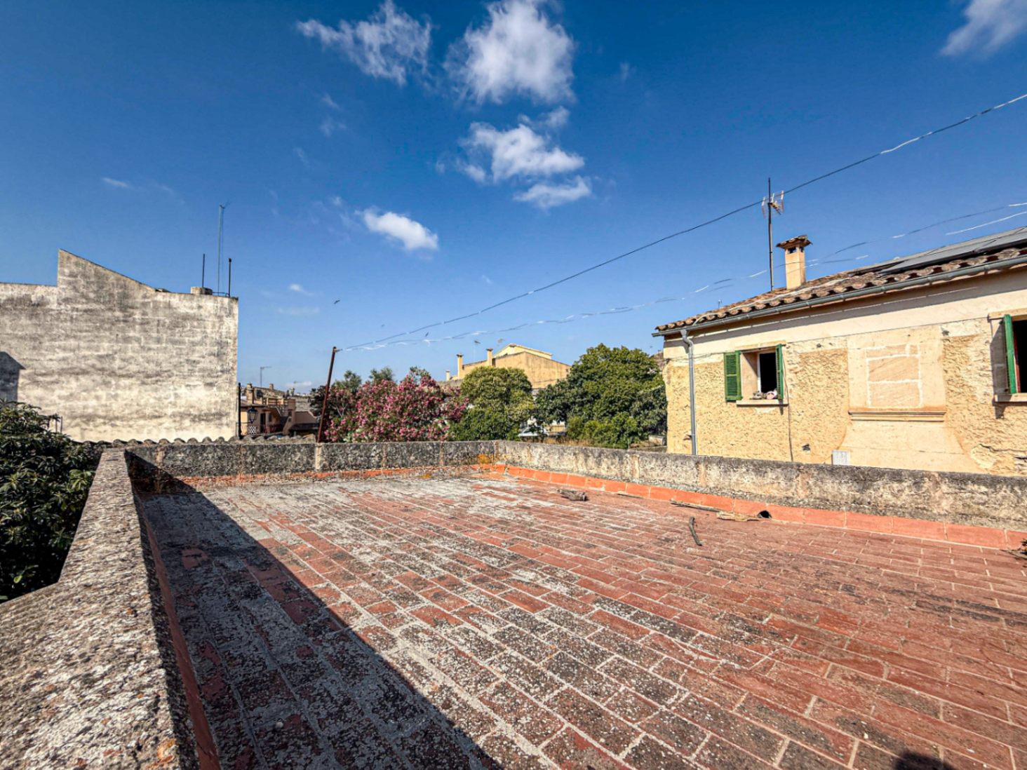 Spacious Duplex House in Llubí with Patio, Garage, and Potential for Upgrades