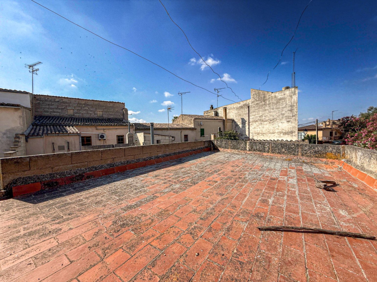 Spacious Duplex House in Llubí with Patio, Garage, and Potential for Upgrades