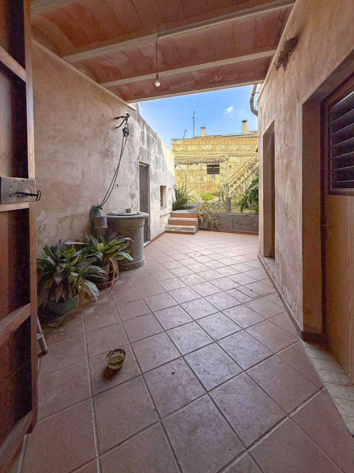 Spacious Duplex House in Llubí with Patio, Garage, and Potential for Upgrades